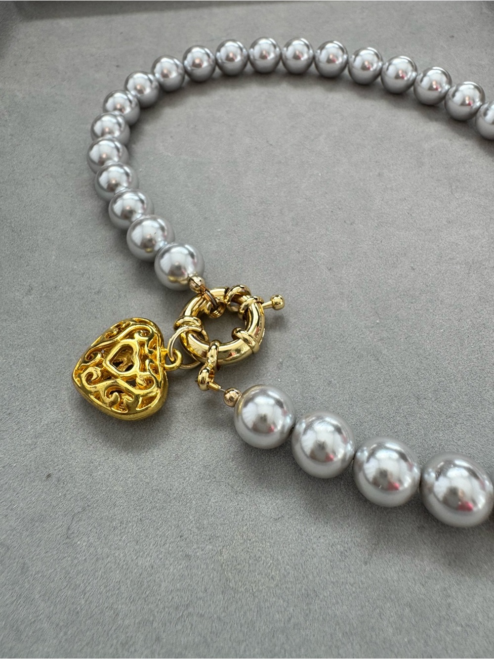 Elegant Silver Pearl Necklace with Gold Heart Pendant